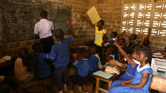 Children undergo inclusive schooling in a classroom in Sierra Leone.