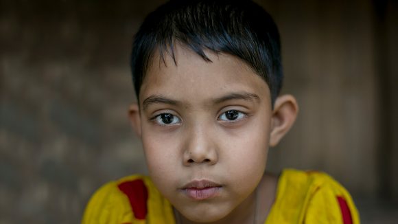 A close up of Muslima's face.