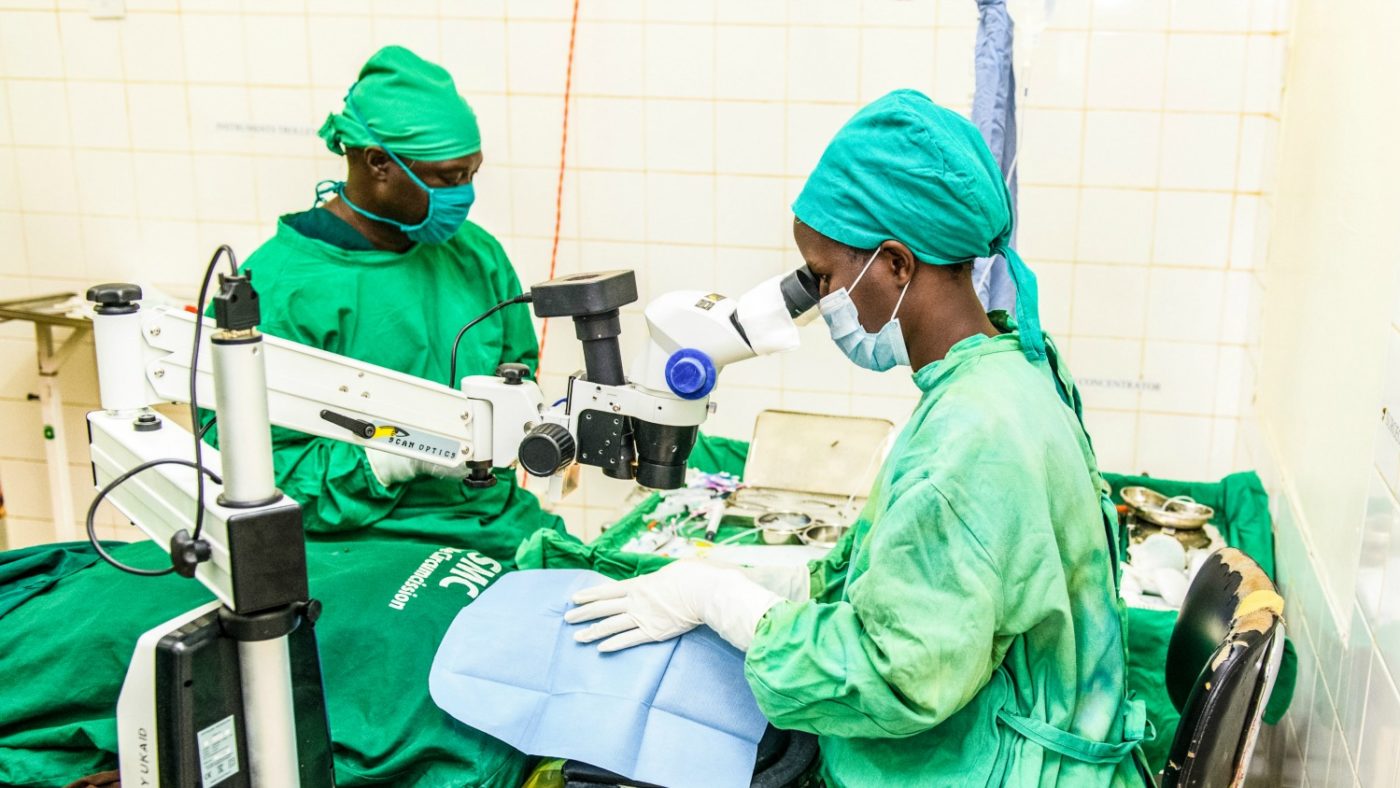 Gladys, an ophthalmologist, is in surgery operating on a cataract patient.