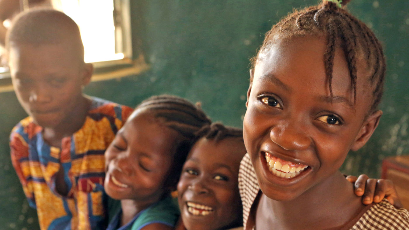 A group of smiling children.