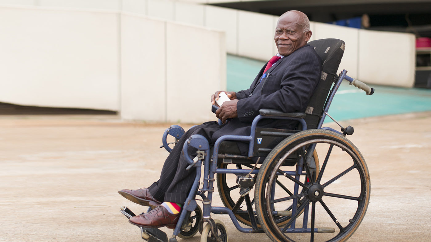 A man in a wheelchair.