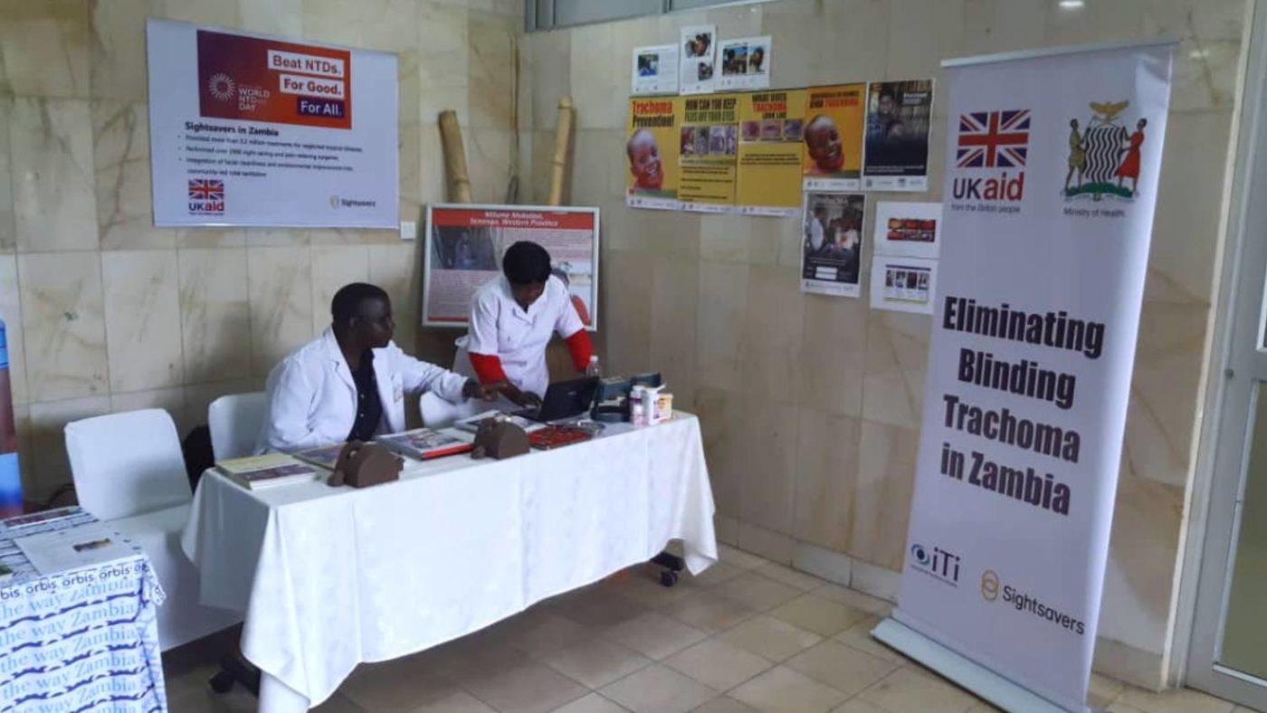 Sightsavers' Zambia team have a stand at a World NTD Day celebration.