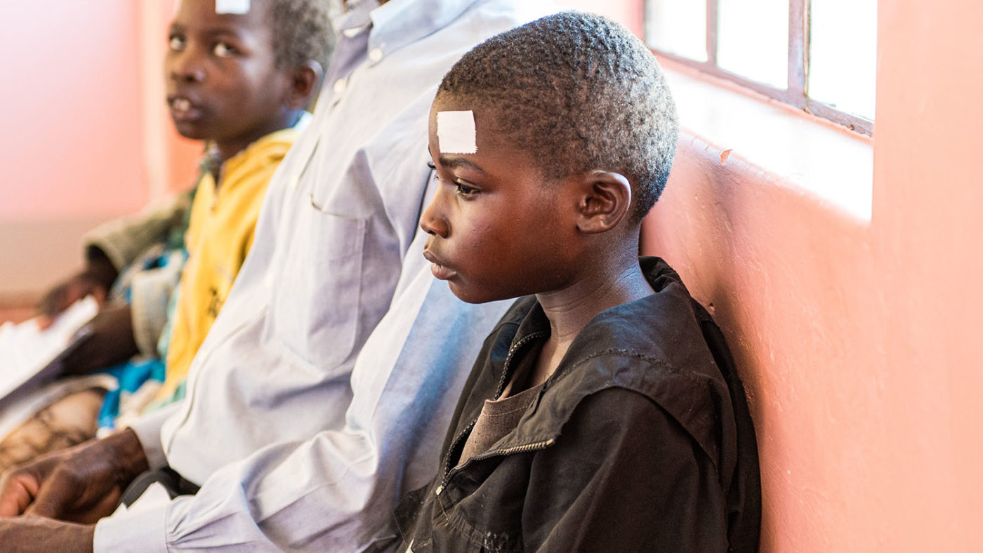 Mary sits in the hospital waiting room.