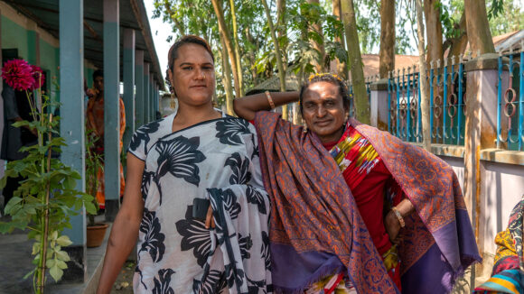 Two women standing outside.
