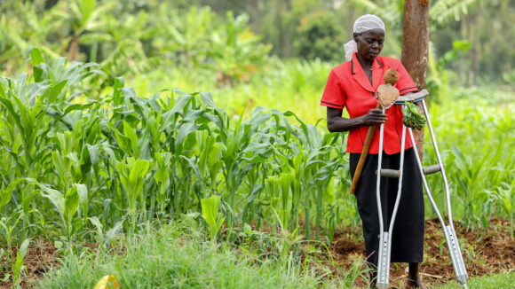 Jeniffer Atieno Opito tends to her crops.