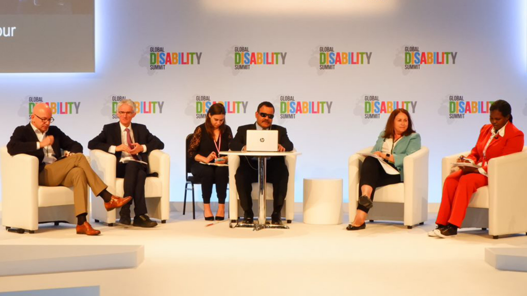 Participants on stage at the 2018 Global Disability Summit