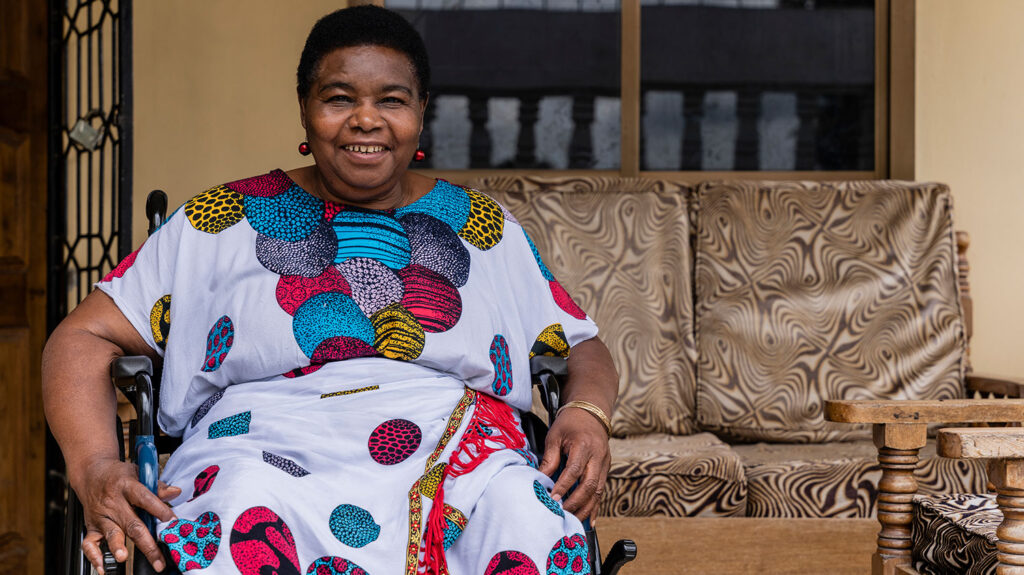 OPD leader Sarah sits in her wheelchair at her home in Singida.