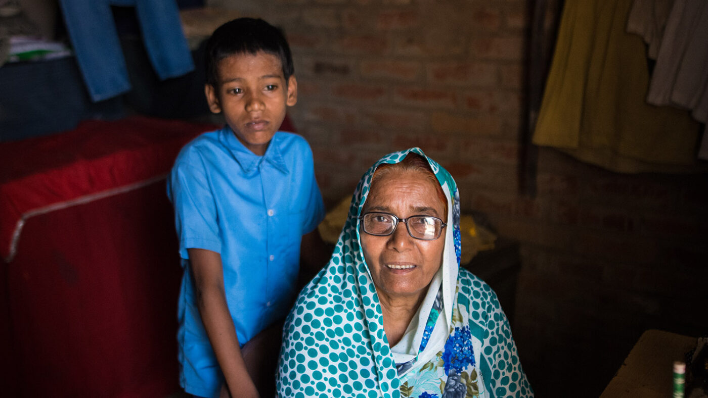 Shahid and his Grandmother in their home in India.