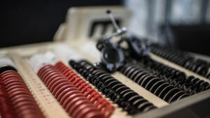 A box of lenses used to check for refractive errors during an eye exam.