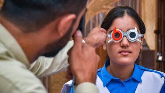 Zahra has her eyes examined.