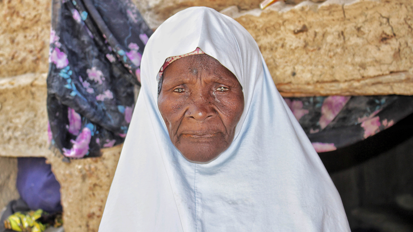 Salamatu stares into the camera.