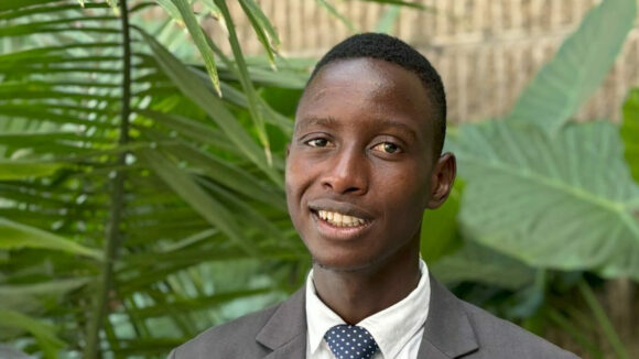 A young man wearing a smart suit.