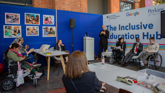 Abia, Tapiwa and James at a panel discussion at the Inclusive Education Hub during the Global Disability Summit.