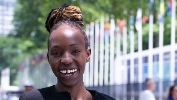 Maryanne stands outside the UN building in New York during COSP-18.