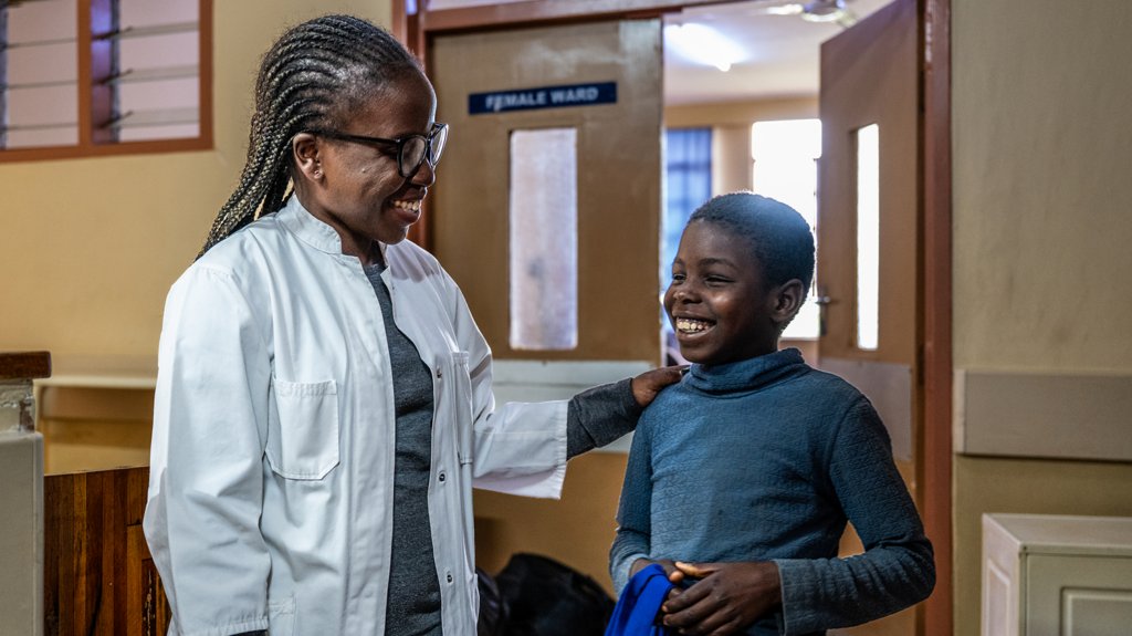 Melia and Dr Chinsinsi, in the hospital smiling.